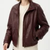 erika alexander maroon leather jacket